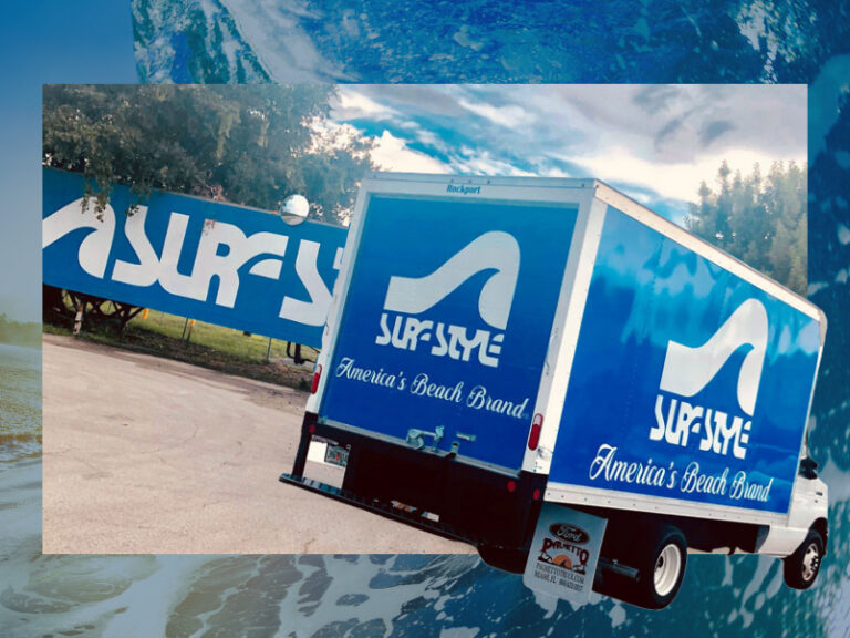 Surf Style box truck wrapped with blue branded graphics