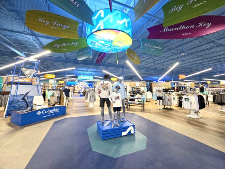 Exhibition hall with branded trade show booths and overhead fabric displays