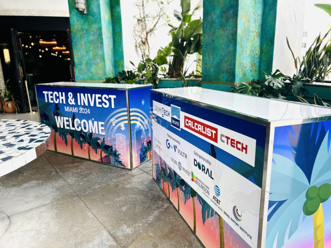 Tech and Invest Miami welcome and registration counter graphics