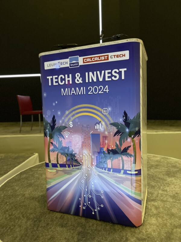 Freestanding Tech and Invest Miami 2024 printed event display
