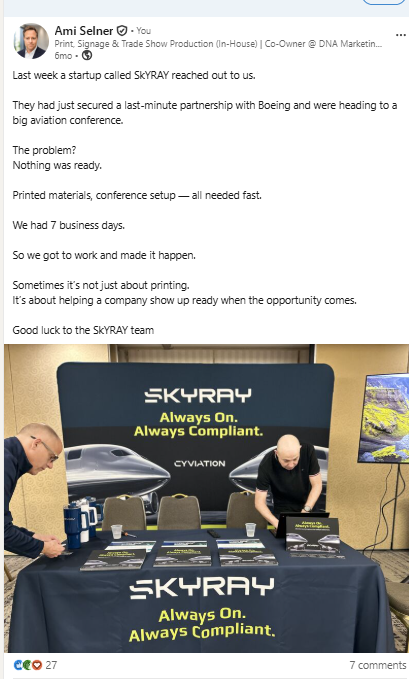 SKYRAY conference backdrop, branded table cover and printed materials at a Hyatt aviation event