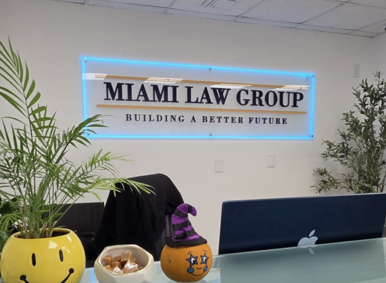 Miami Law Group dimensional wall sign above a reception desk