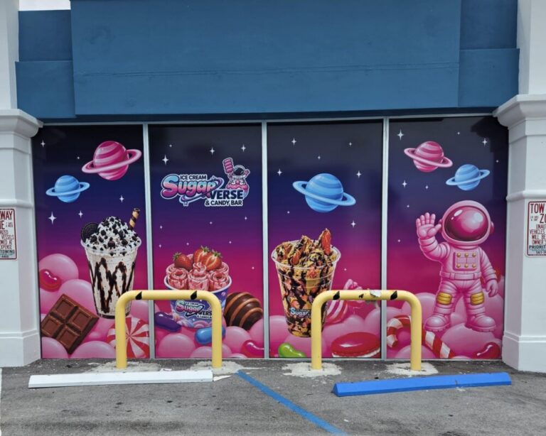 Storefront window graphics and retail branding produced by DNA Marketing & Printing