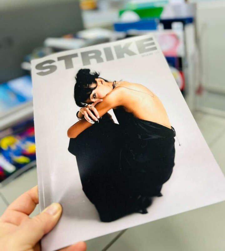 Another printed Strike Magazine issue showing the finished cover